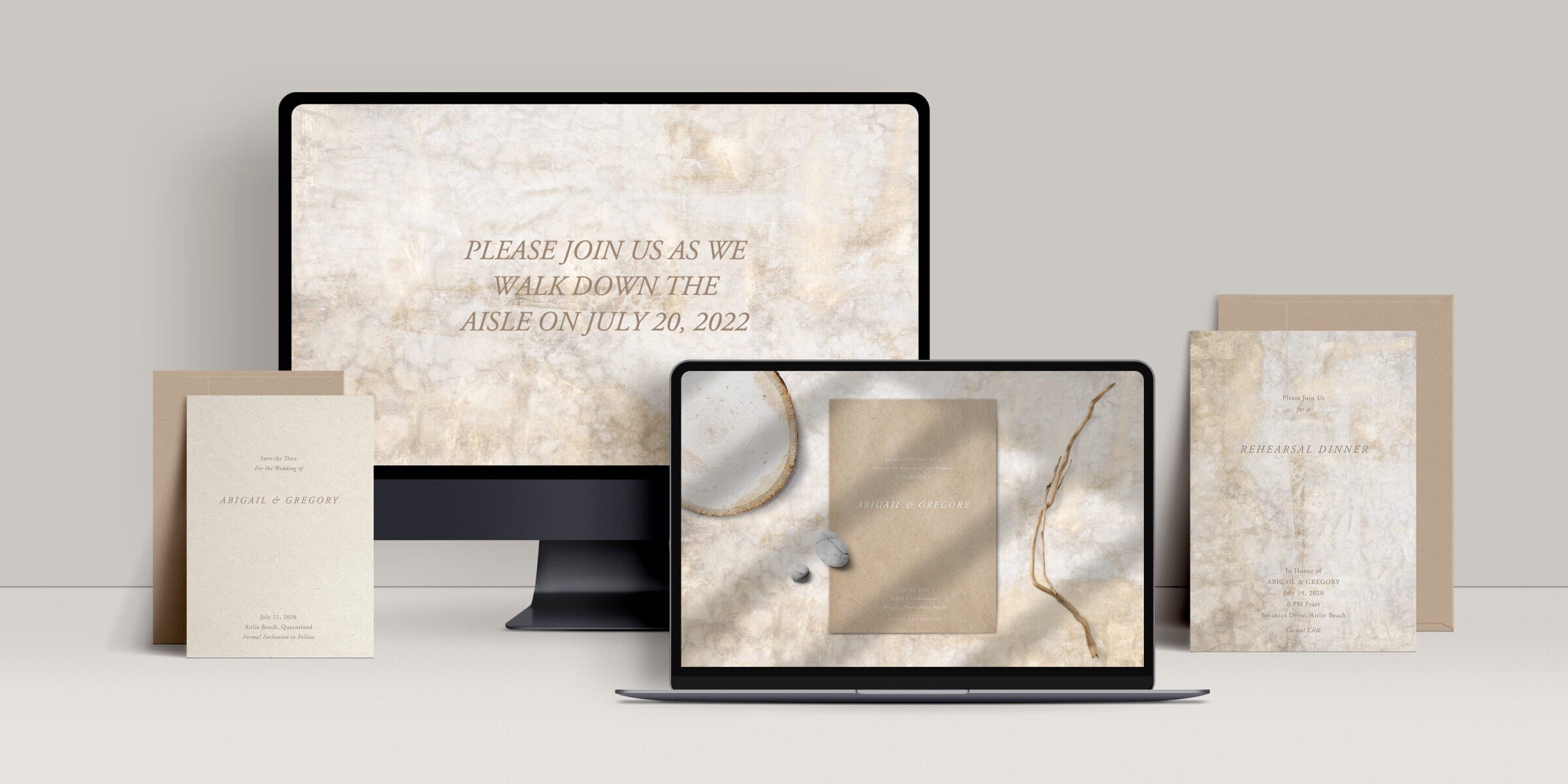 A monitor and laptop screen showing an earthy wedding website and online wedding invitation, plus coordinating printed stationery