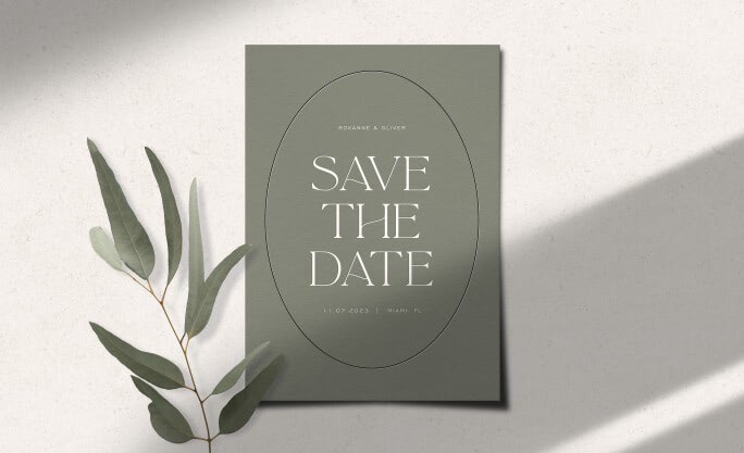 A forest green electronic Save the Date with a virtual leaf stem as an accent